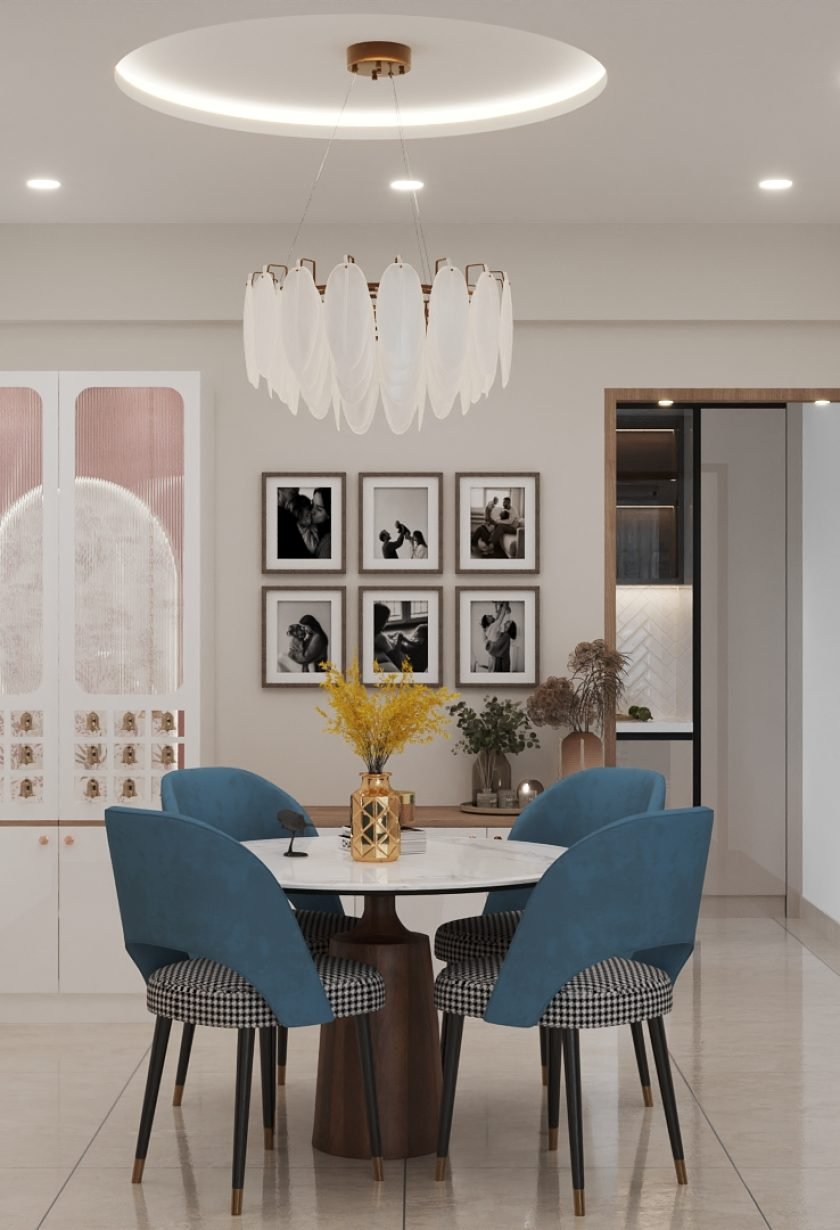 Dining Room Design by ONNEXT Interios a dining room with a round table and blue chairs
